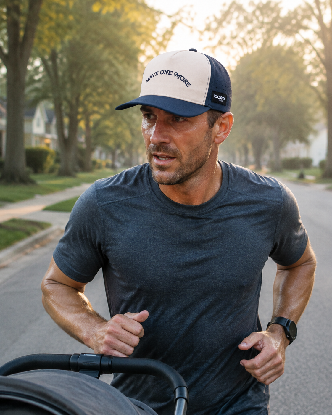 Father running with a stroller in the Have One More BOCO Running Trucker Hat